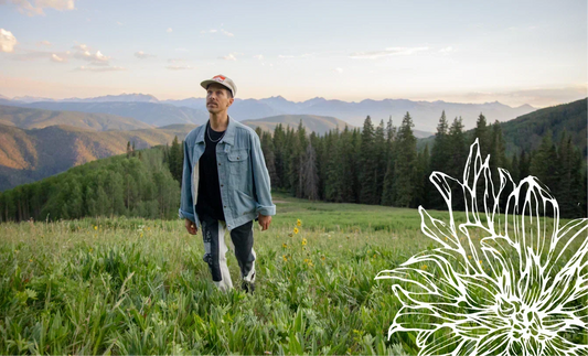 Photo of a guy in a photo landscape with a floral graphic layered over it.