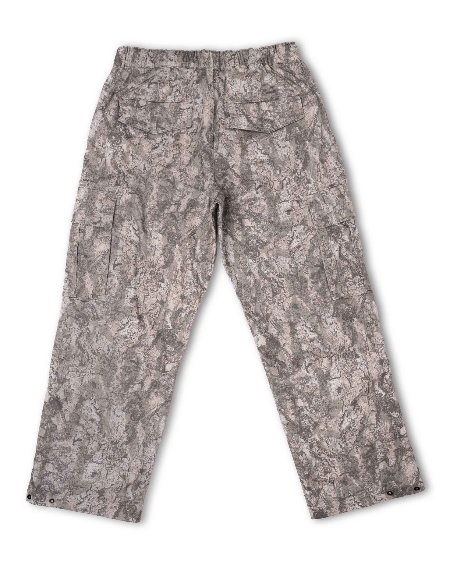 A pair of cargo pants with an all-over gray and beige digital camouflage pattern, shown from the back on a white background.
