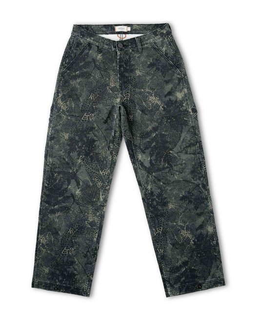 Front of a camouflage leaf patterned pant on a white background.