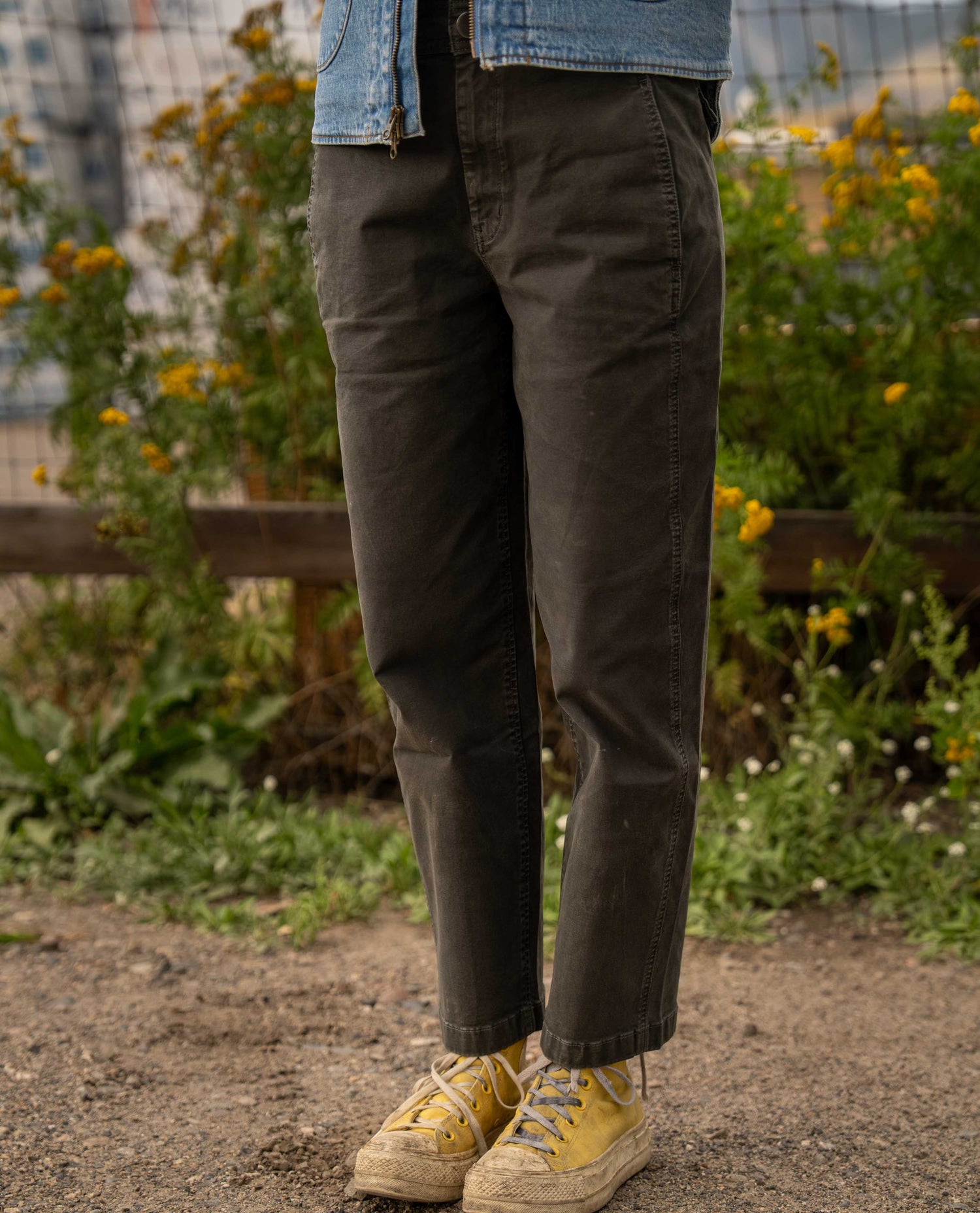 Dark gray pants with yellow shoes on a lady in Montana