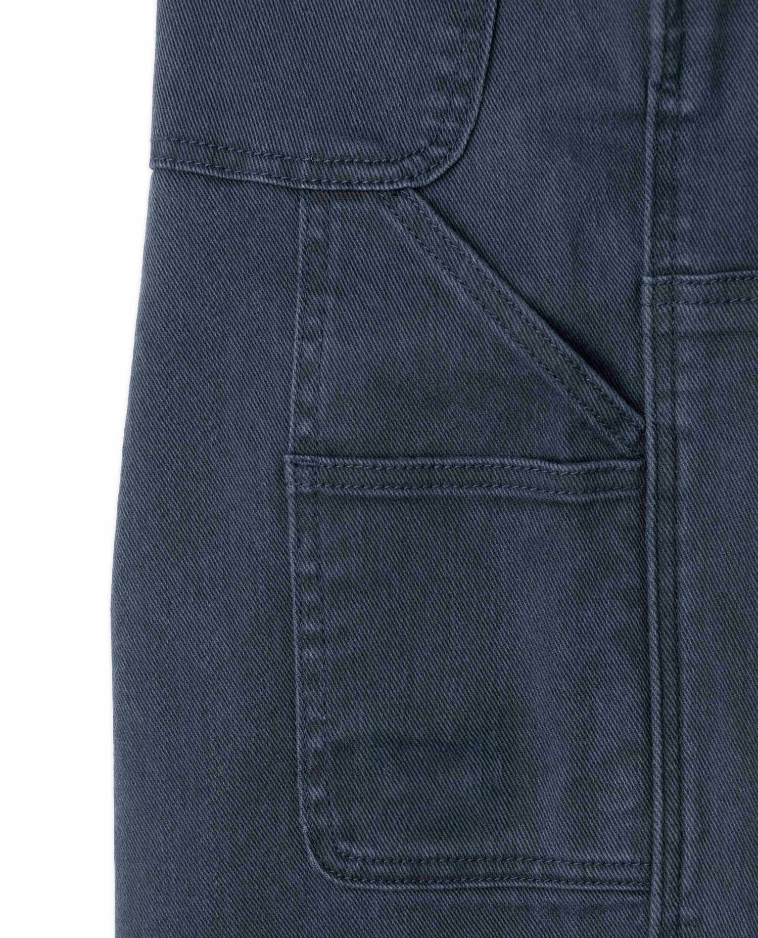 Close detail of fabric and pockets on Navy Sport Utility Pants.