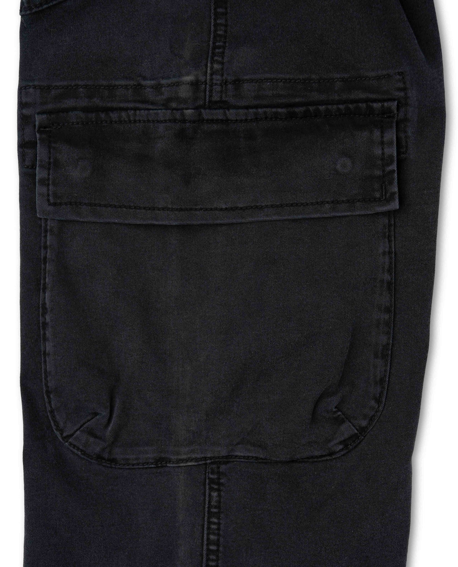 Close-up of a black pocket on a garment with a white background