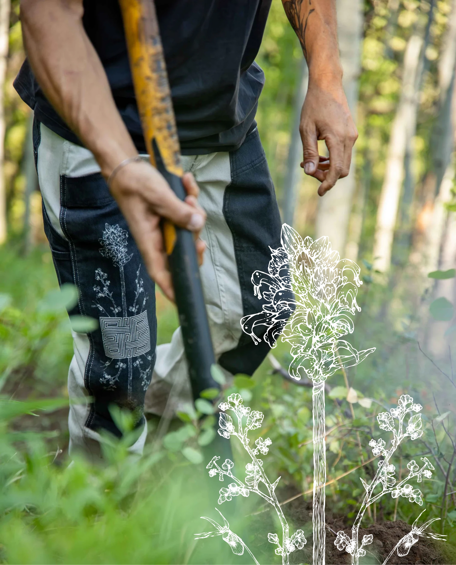 A person in a forest holding a shovel, wearing dark and light gray patchwork work pants with white botanical line-art overlays in the foreground.